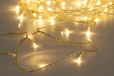 String of small lights on a neutral background